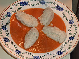 Quenelles de poisson et fruits de mer