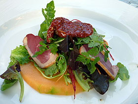 Salade magret, tomates confites et melon